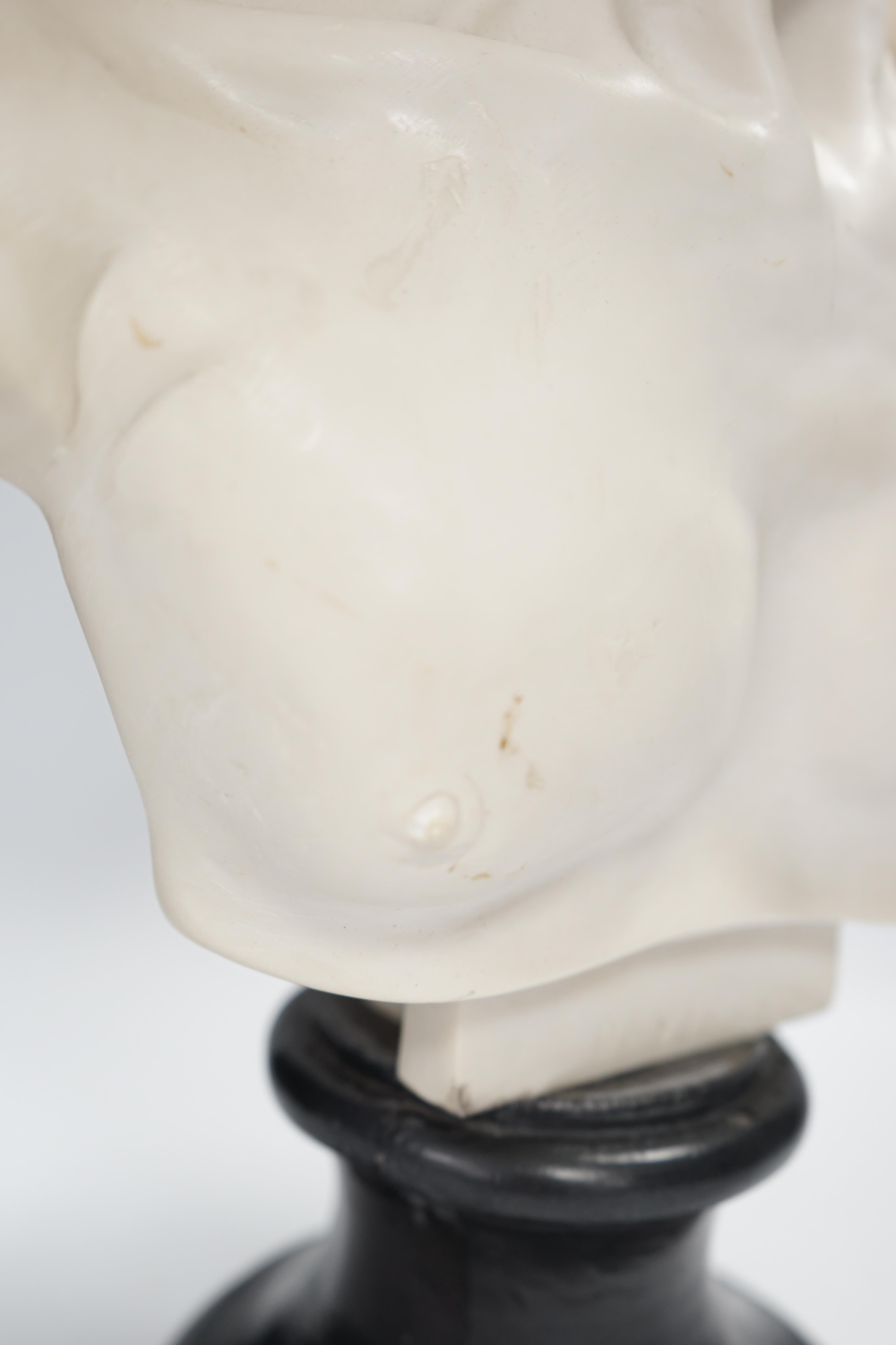 A simulated white marble bust of David, 52cm